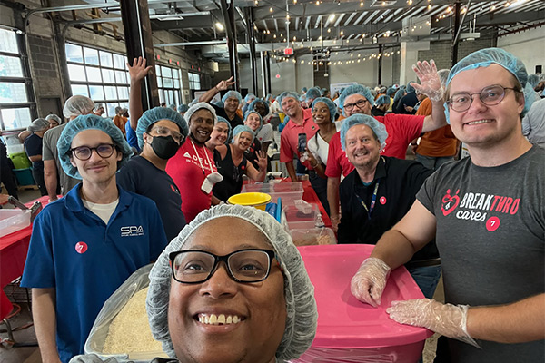 SPA employees volunteer to pack meals at the 9/11 Meal Pack event