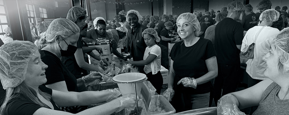 SPA Volunteers Make a Difference at 9/11 Meal Pack Event