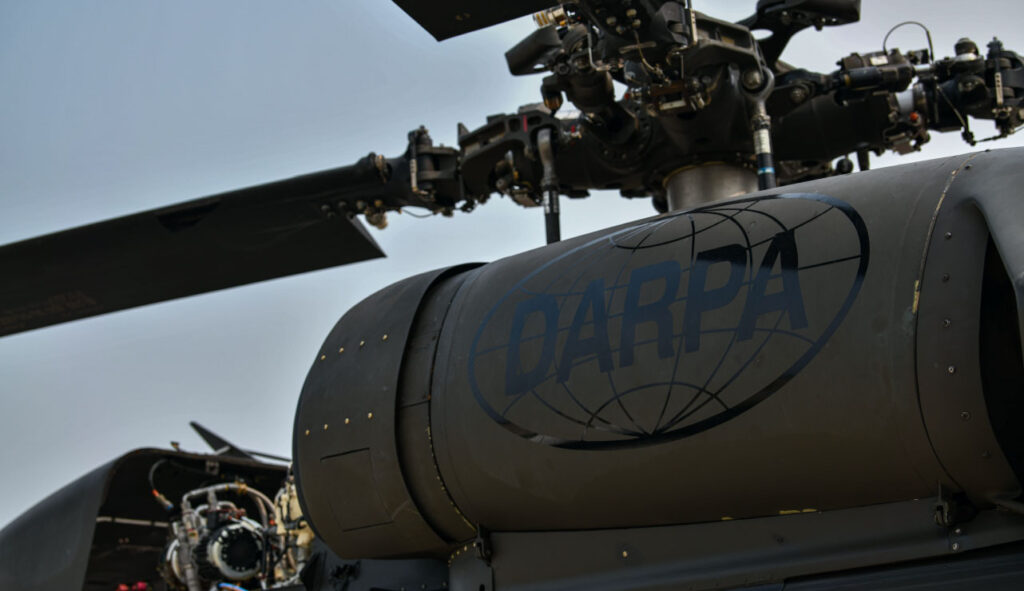 An image with the DARPA logo depicting transferrable lifecycle support at SPA