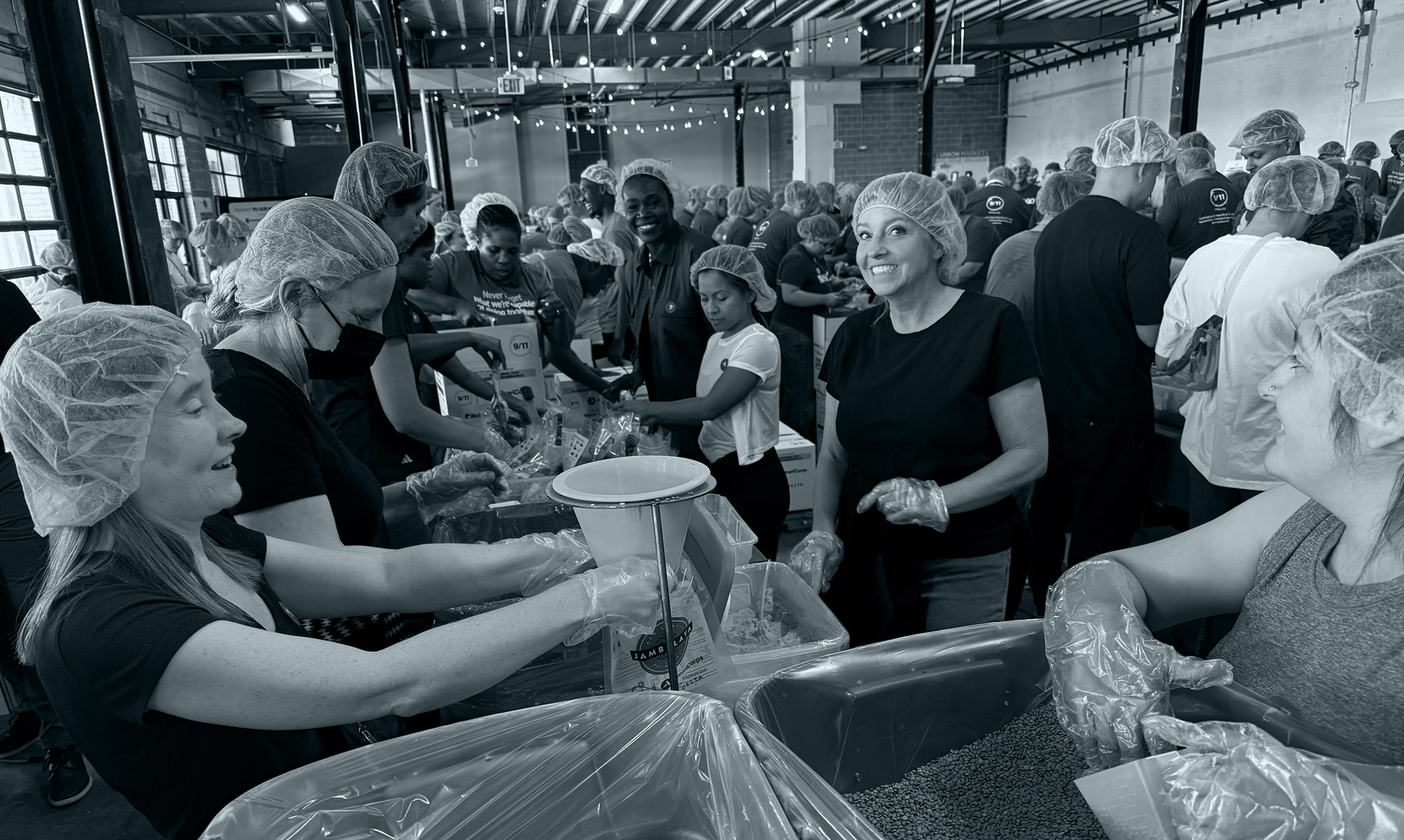 SPA Volunteers Make a Difference at 9/11 Meal Pack Event