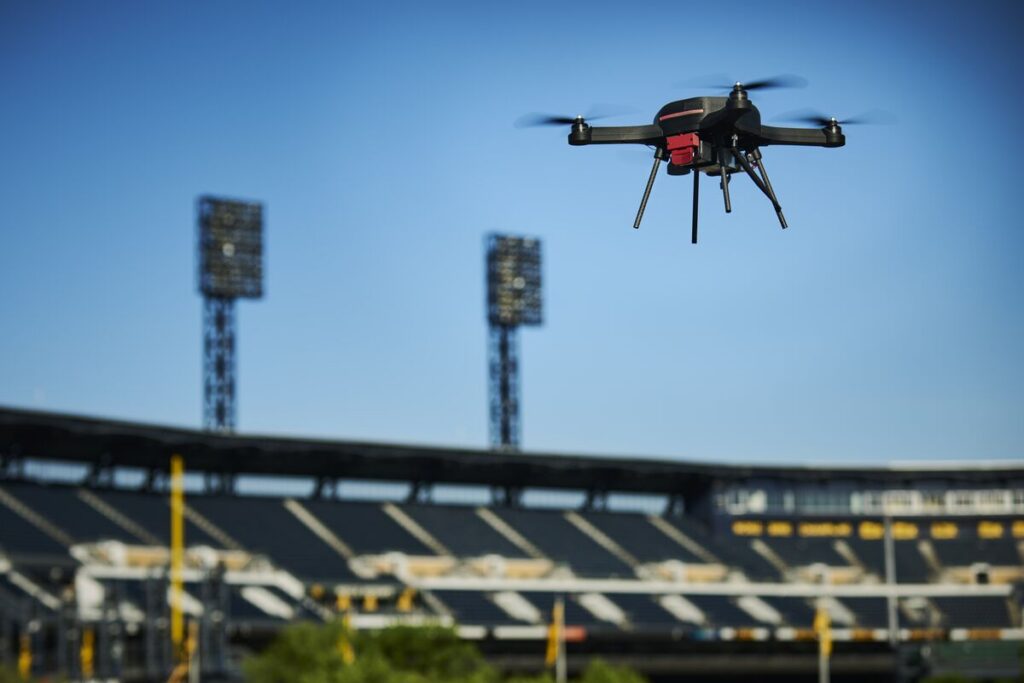 A UAS flies near a Stadium. Replay the PSN x SPA Stadium Threats webinar